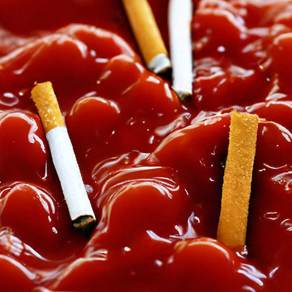 Cigarette butts in tomato sauce